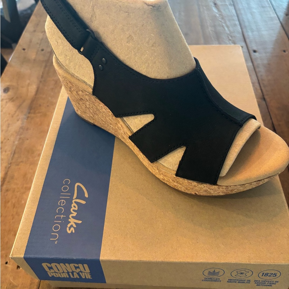 Clarks Black Wedge Sandals with Modern Peep-Toe Design